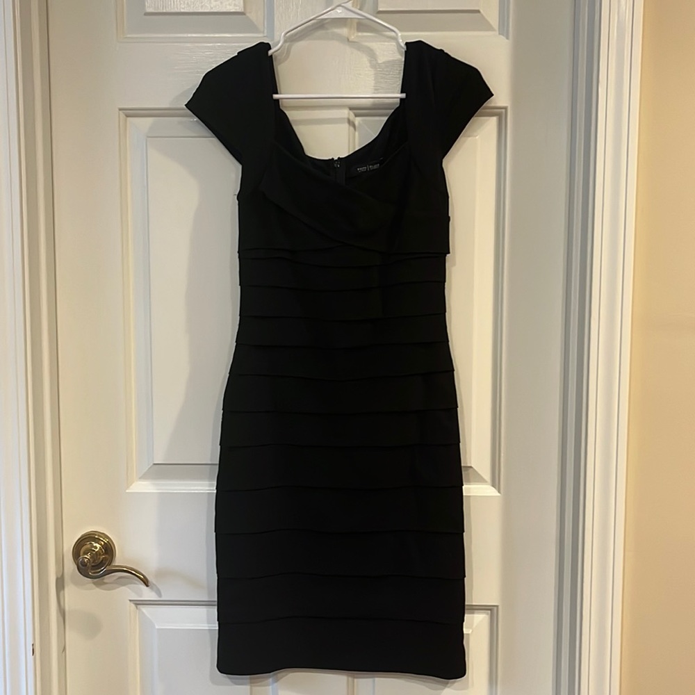 Super cute black dress.